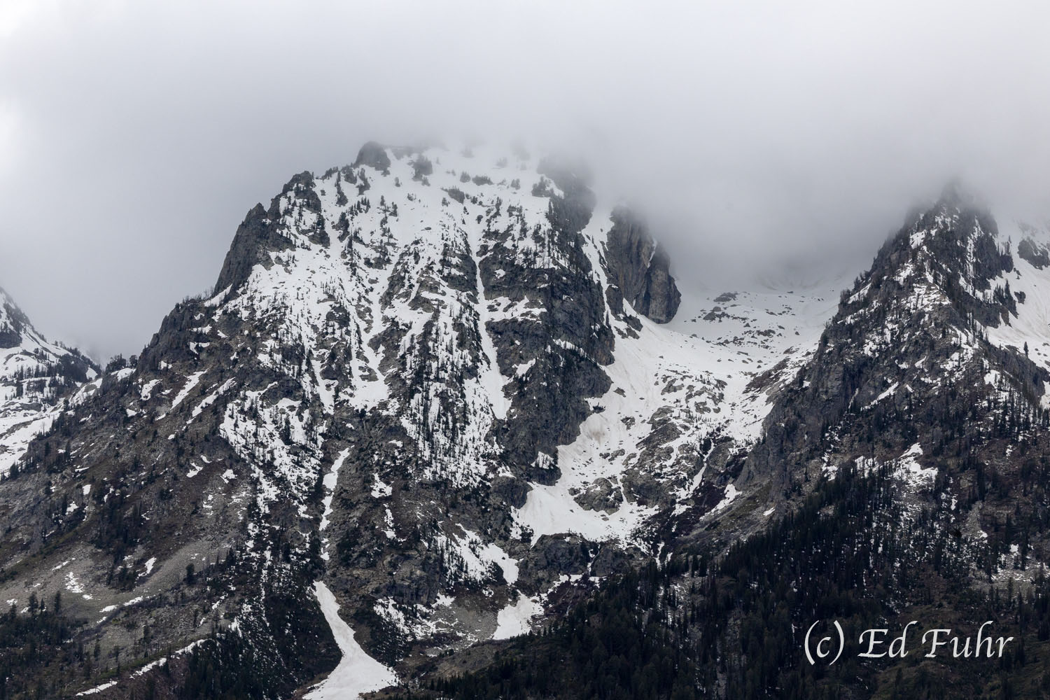 Winter's Hold Even in mid June there remains a decidedly wintry feel to the upper realms of the Teton range.