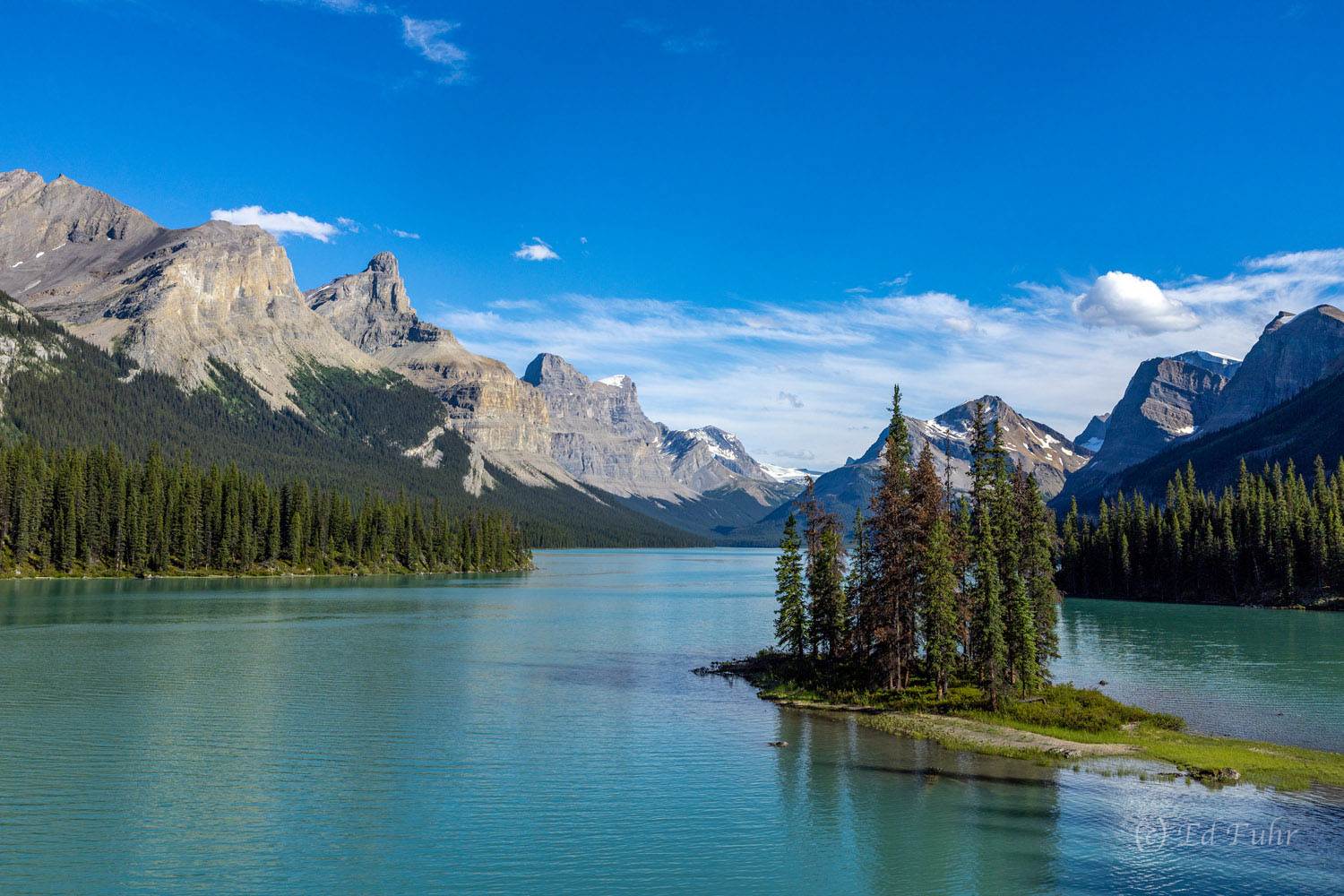 In the heart of Jasper National Park sits magnificent Maligne Lake and its tiny jewel, Spirit Island.   Considered a sacred place...