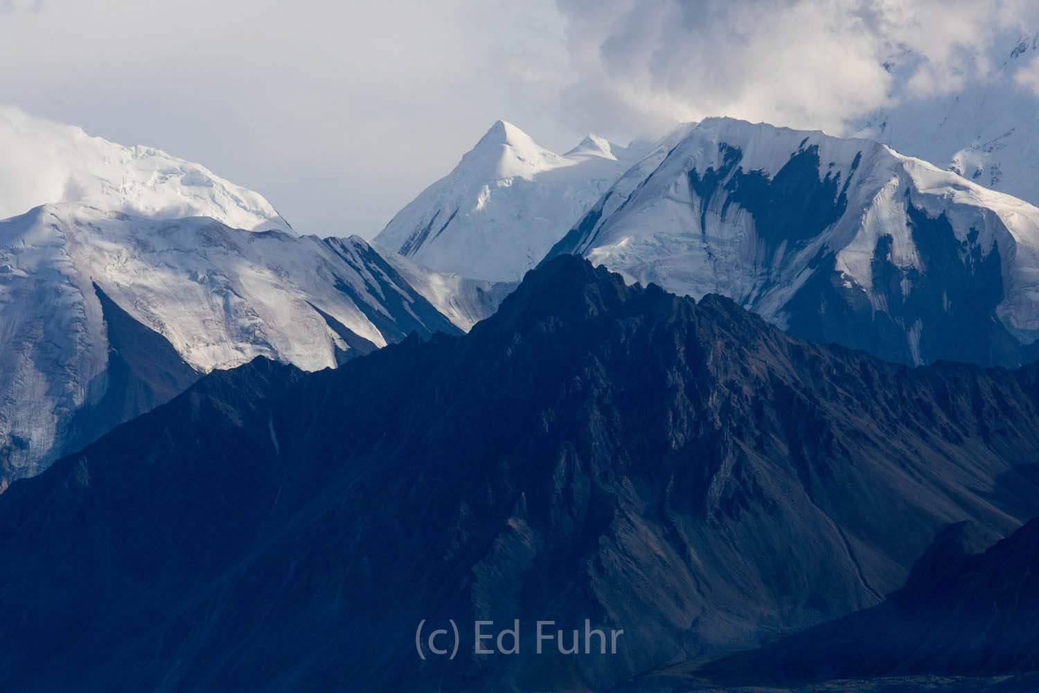 The peaks of Denali appear like winter even in early August.