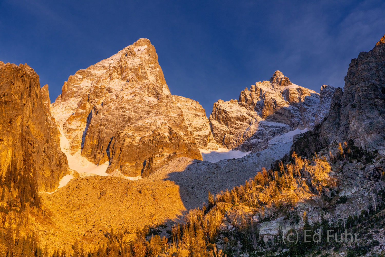 It takes a long and steep climb to reach the upper realms of the Grand, the highest peak in the Teton range.  But a sunrise like...