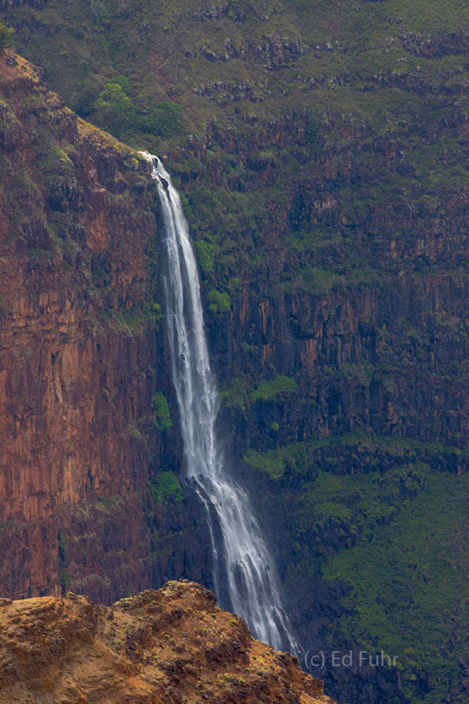 Located in Waimea Canyon, this Falls is visible from many of the canyon's overlooks, completing this postcard scene.