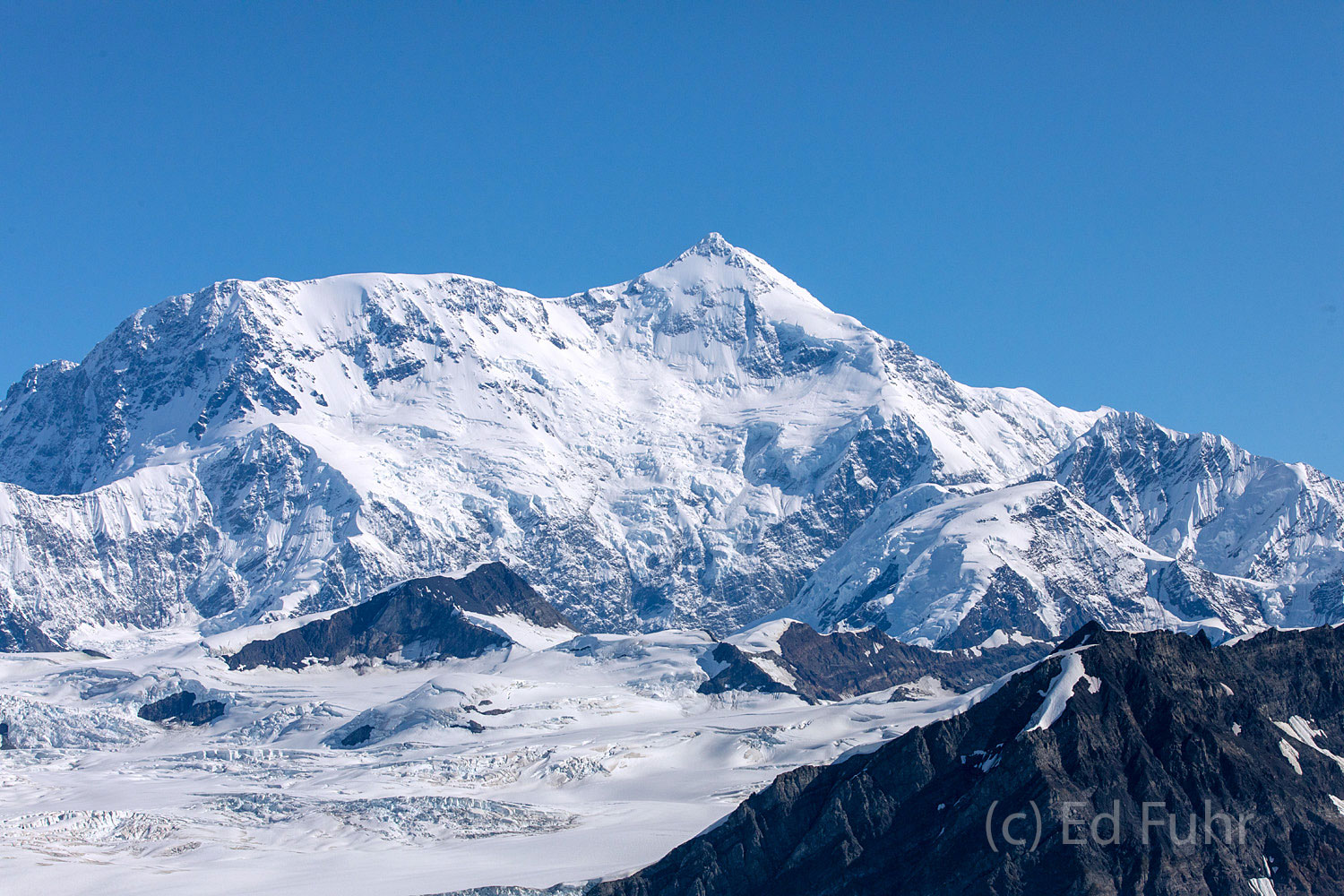 Mount Saint Elias, the second highest mountain in both Canada and the United States, rises from the shores of the Pacific Ocean...