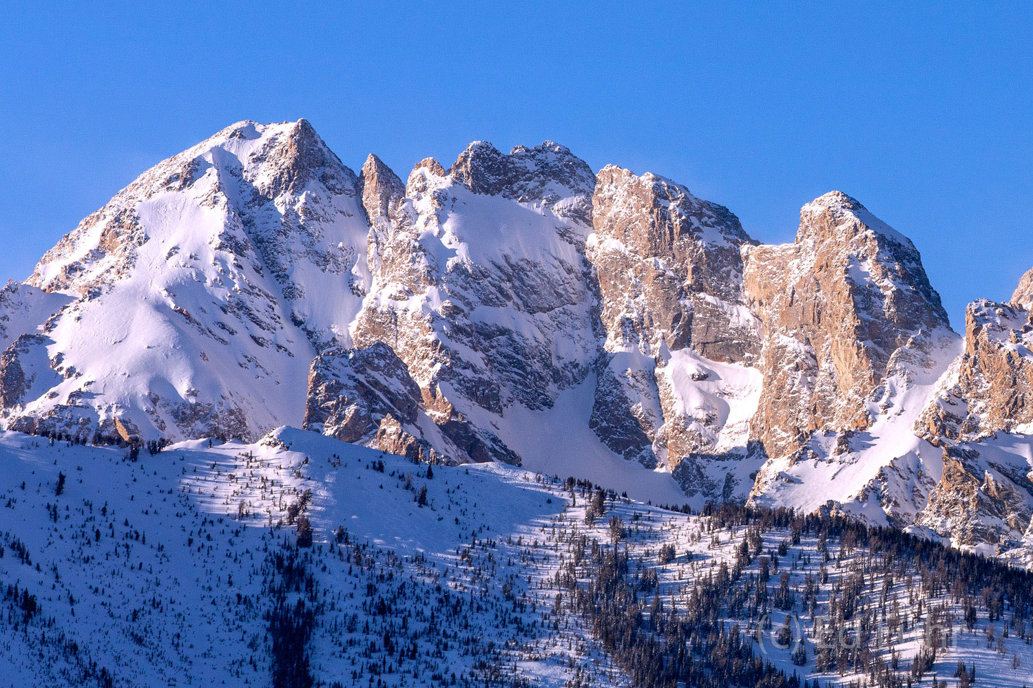 The spires of the Grand Tetons are glorious and foreboding in winter when storms can appear with little notice.