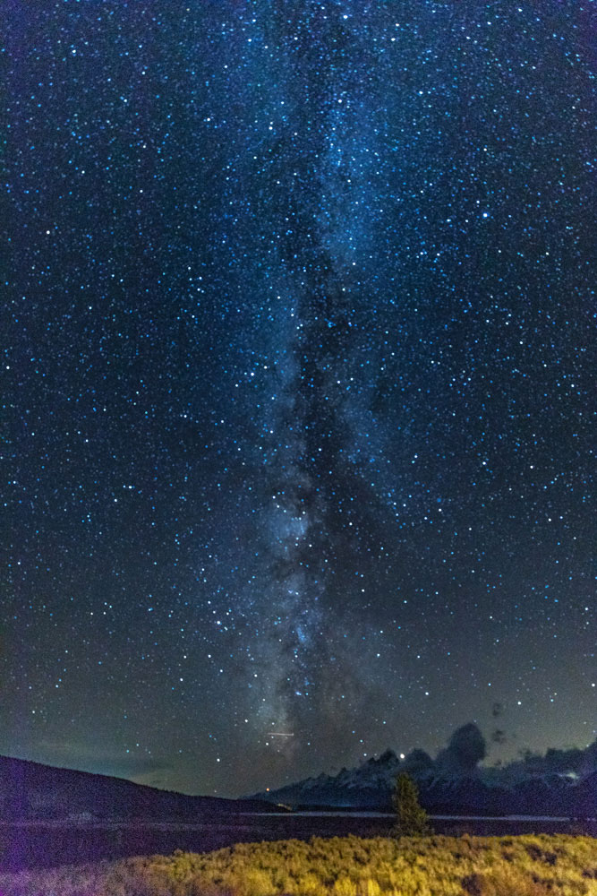 As vast as the Teton range and surrounding valley feel in daytime a whole new perspective emerges under the milky way.