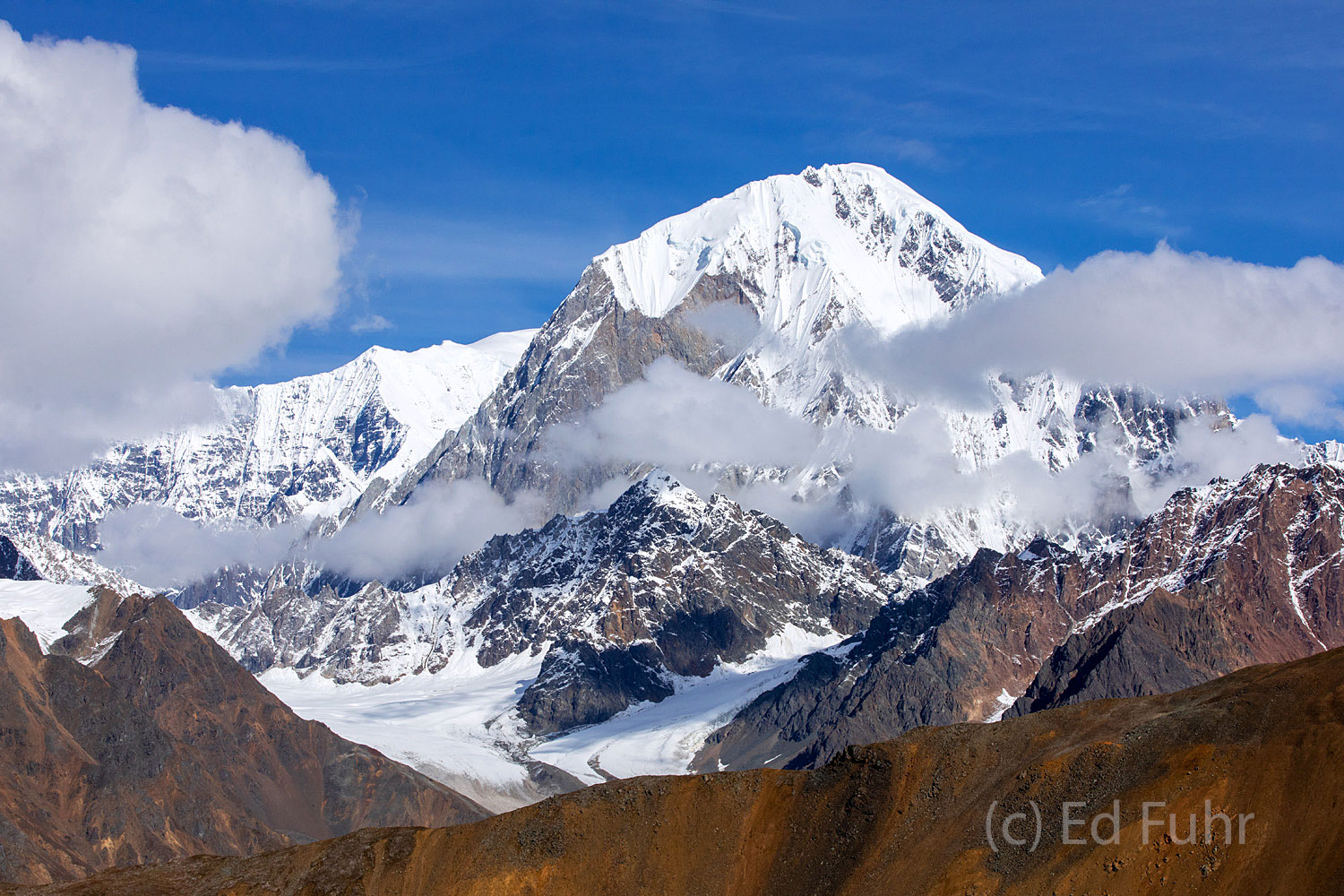 A long morning brings with it a chance to touch down for lunch on a high mountain shelf, with this stunning view.