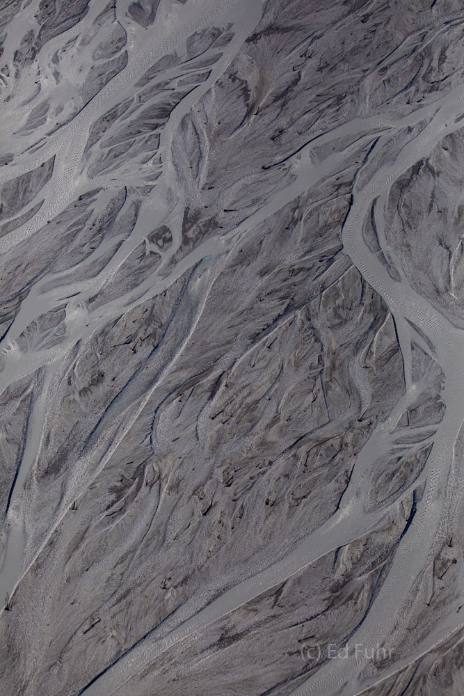 Stream Beds Aerial view of Denali's stream beds that carry the sediment and stone ground by the glaciers and snow atop the nearby mountain...