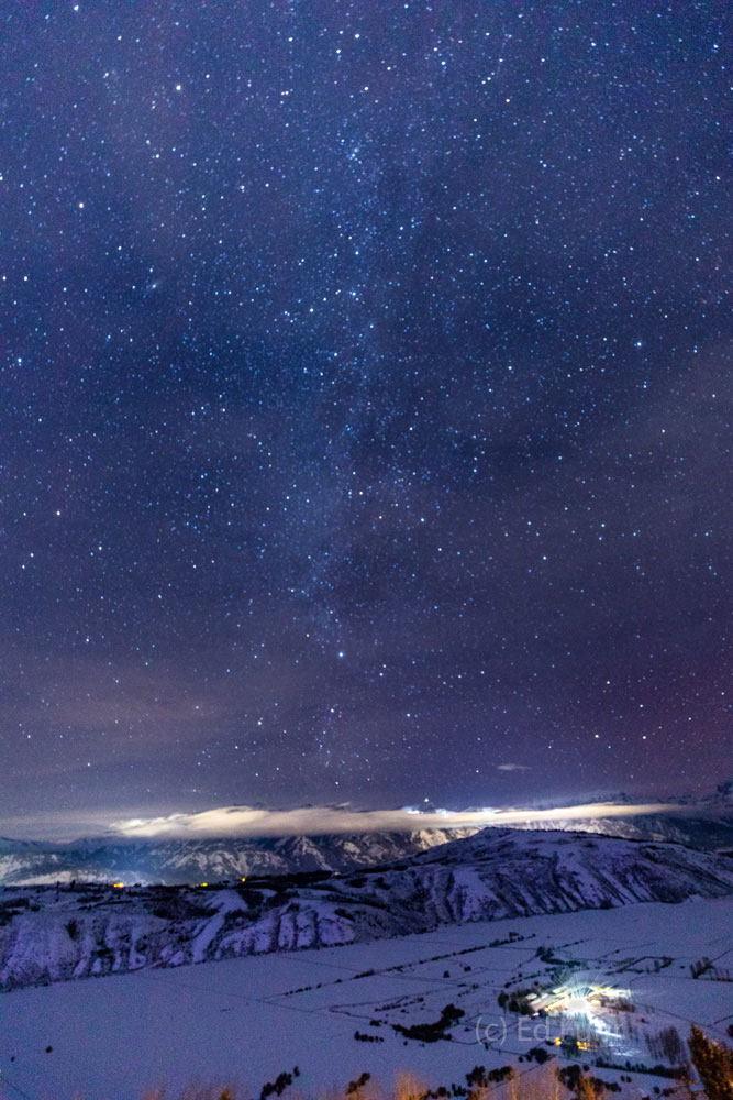 The milky way spans over the Jackson Hole valley.