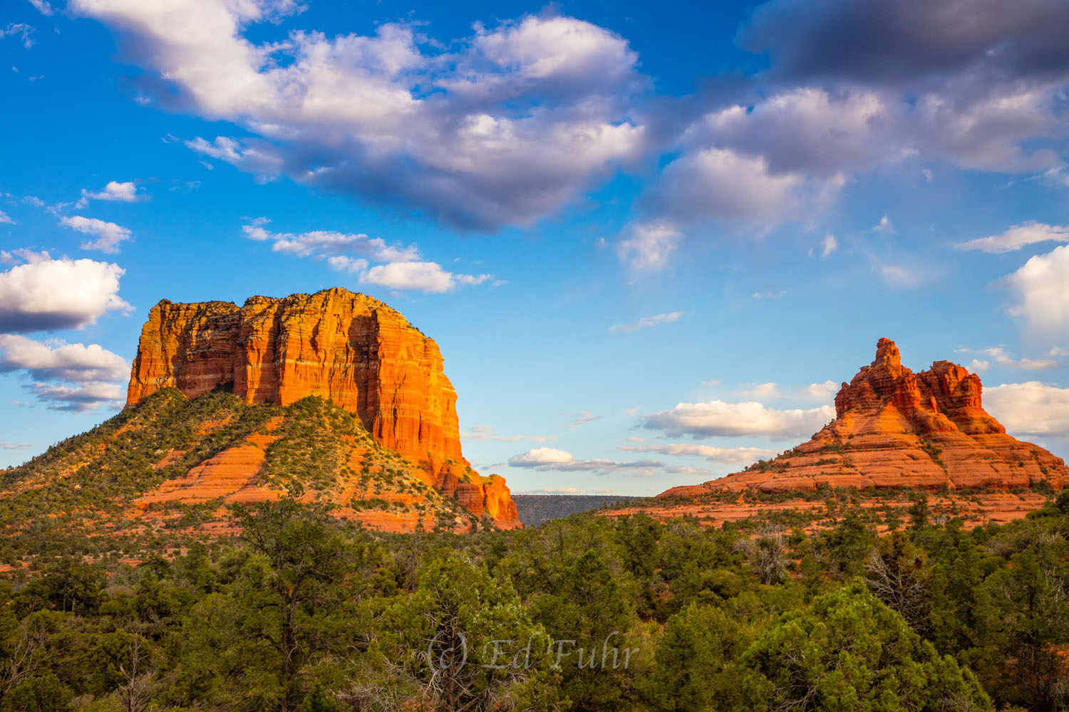 The rock country surrounding Sedona turns fiery red shortly before sunset.