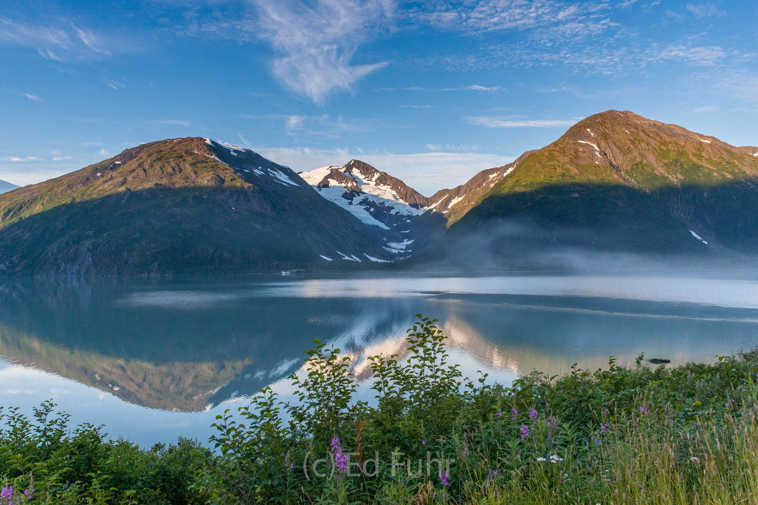 One of the remarkable places to watch sunrise as it gradually lights the peaks across Portage Lake.