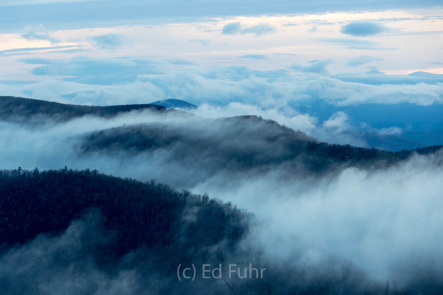 Distant Islands like islands at sea, the highest peaks of Shenandoah's mountains rise through the growing fog.