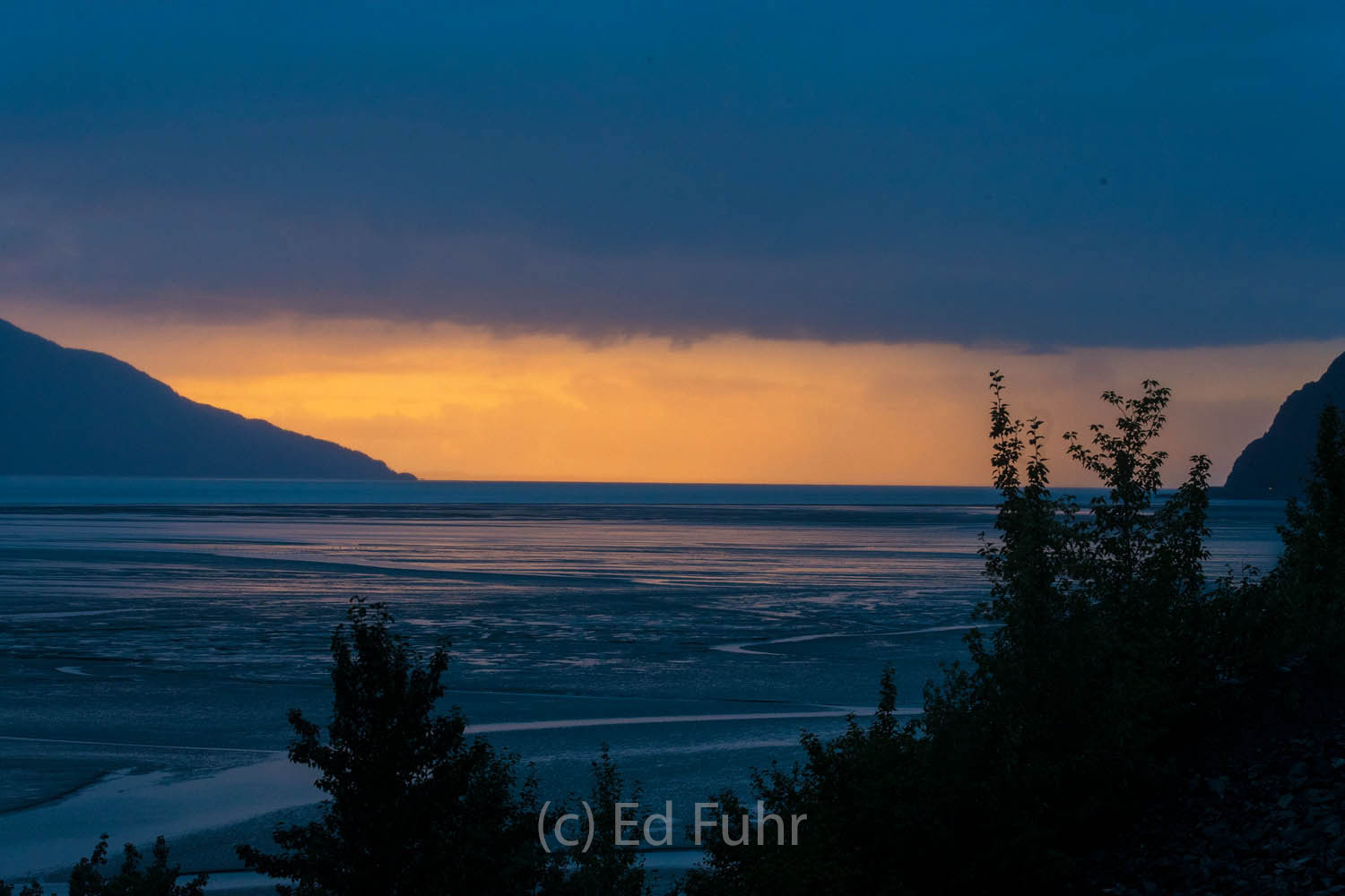 Turnagain Arm features one of the largest bore tides in the world.  The bore tide is a huge wave or series of waves that advance...