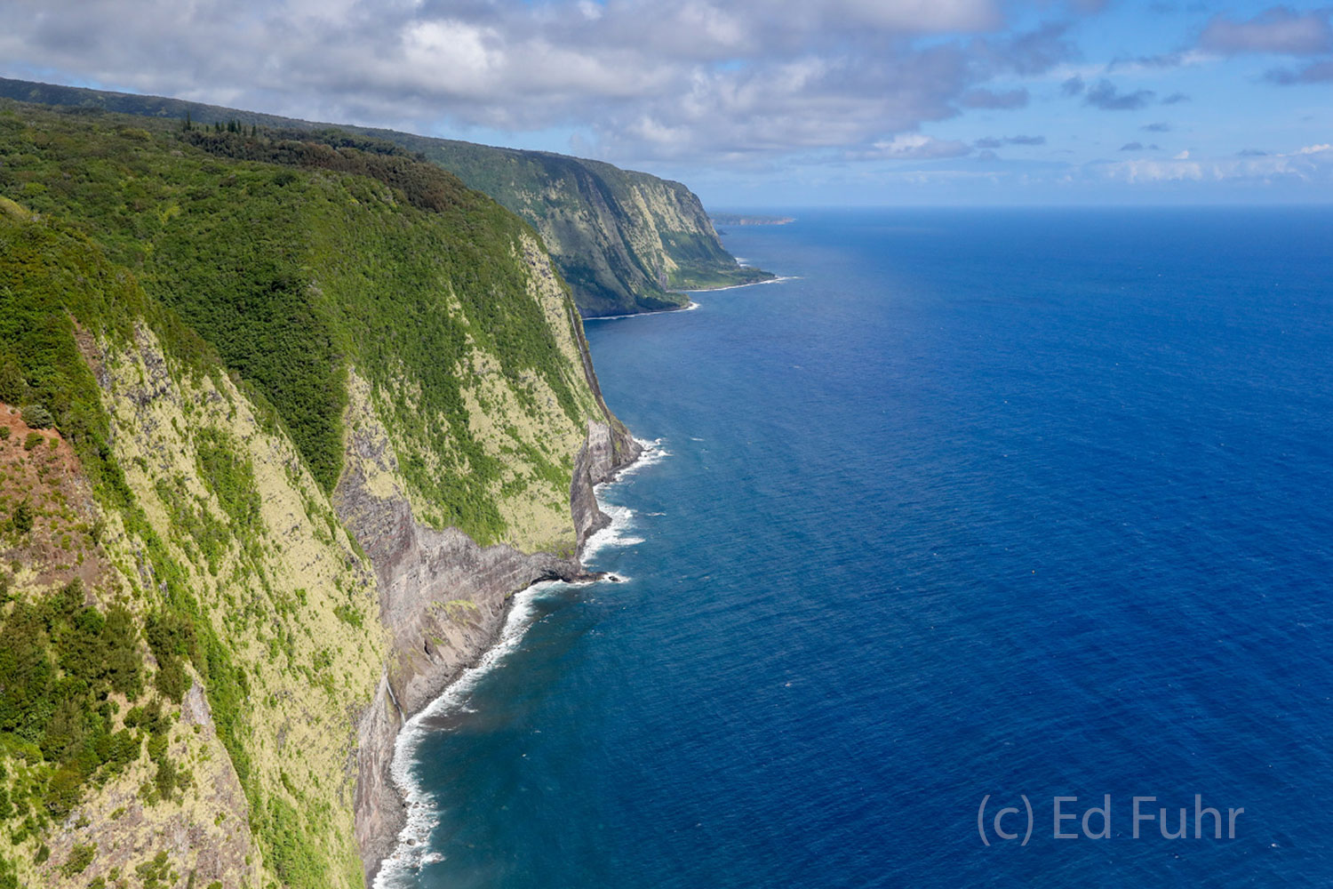 The Hamakua coast is breathtaking with its sheer cliff walls dropping into the ocean.
