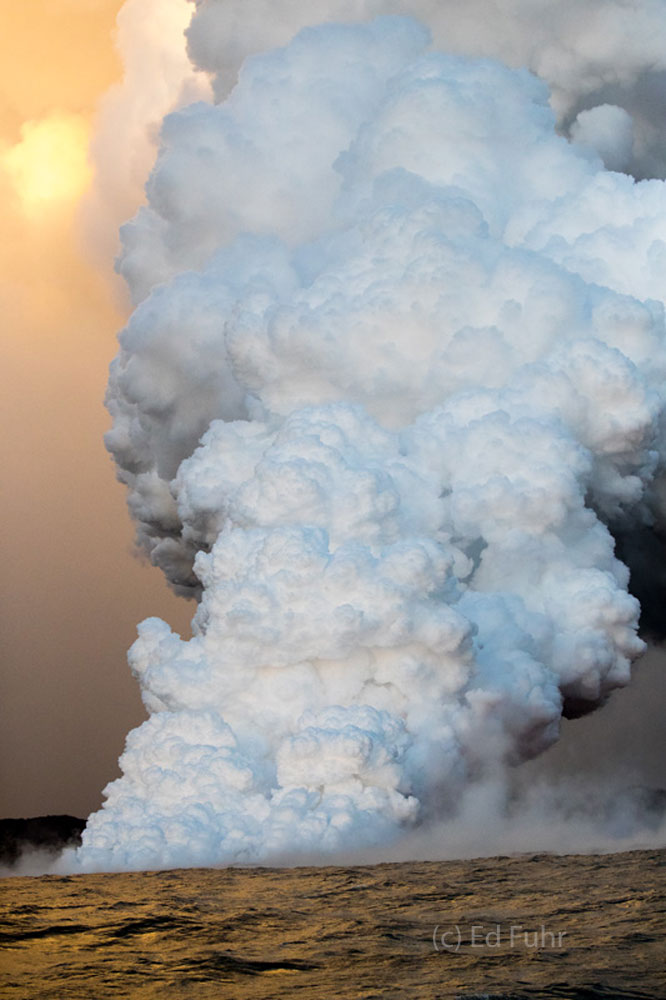 When the 7000 degree molten lava enters the sea it creates a giant plume of steam and also dangerous chemicals that reaches thousands...