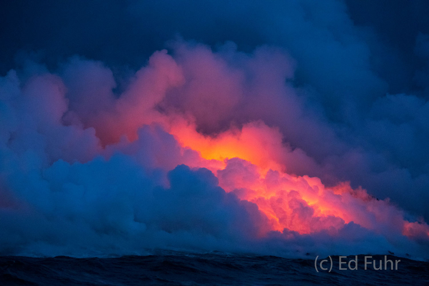 Molten flow of lava into the sea