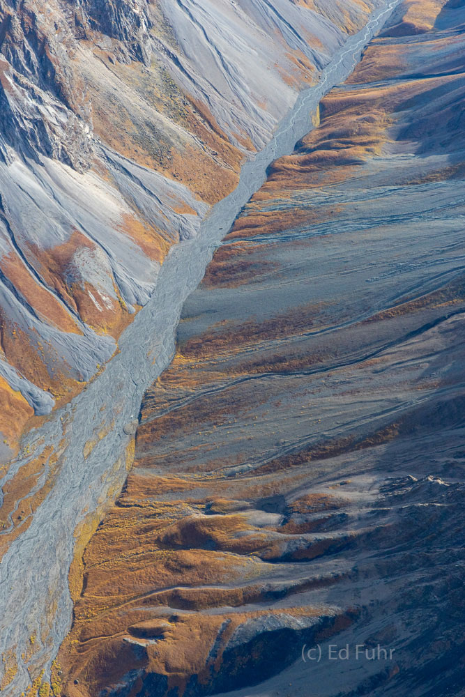 Mineral and water deposits color the Denali floor