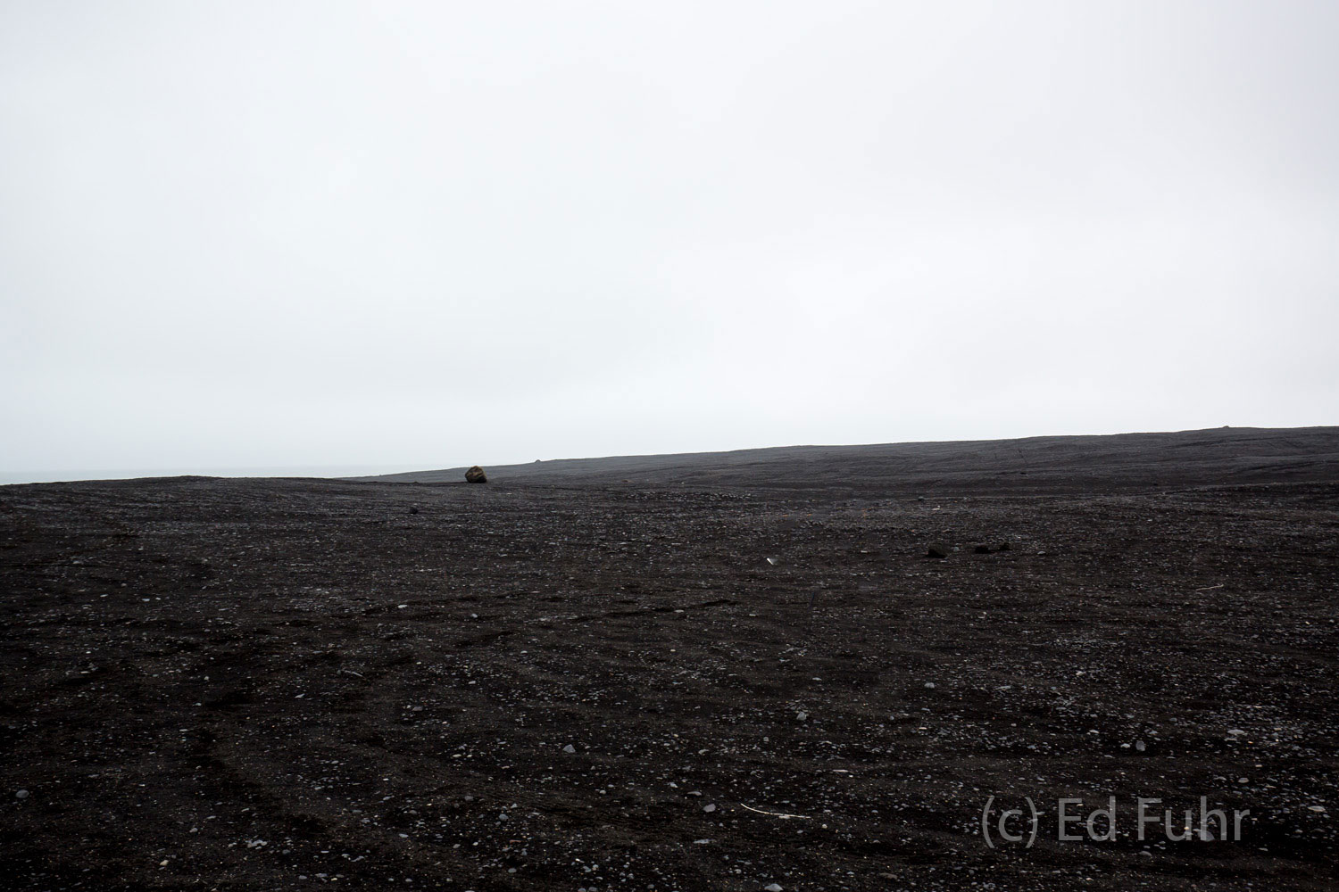 Black sand beaches stretch as far as the eye can see, to where banks of white clouds and fog rise.   The experience is bracing...