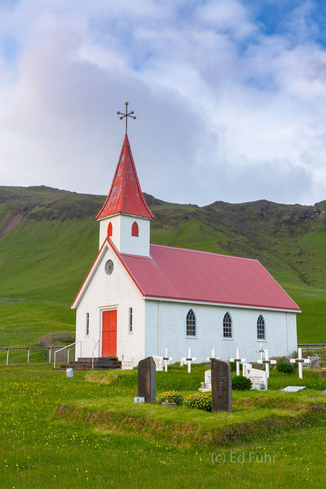 Reyniskirkja Church Not far from the desolate black sand beaches is a remarkable sign of hope, Reyniskirkja Church.