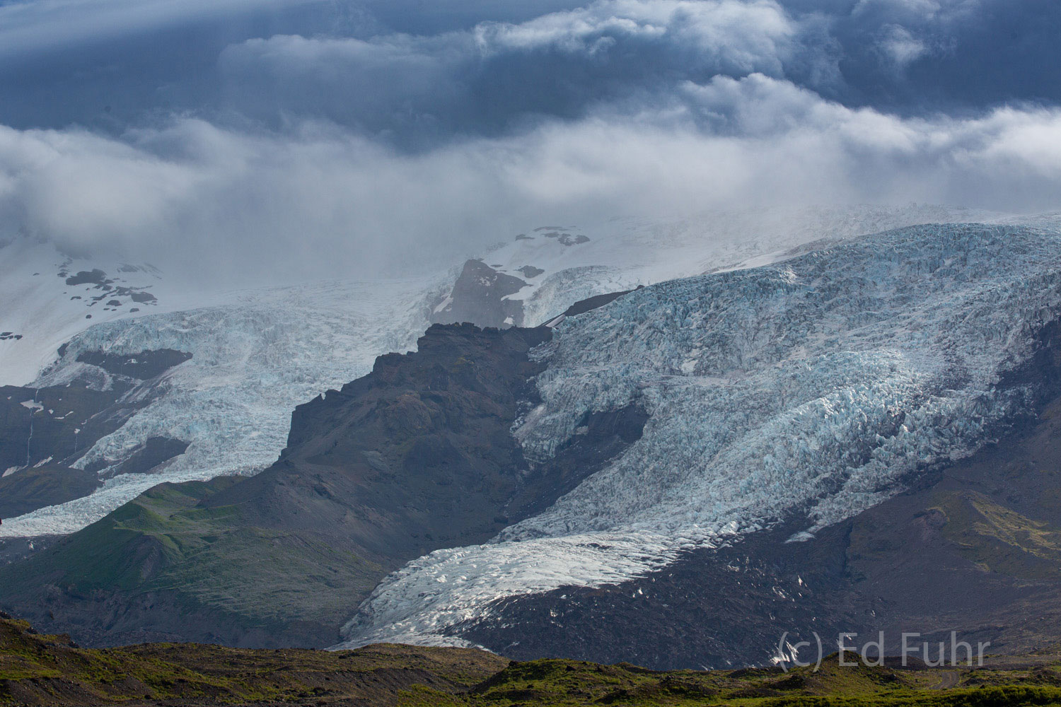 Tongues of ice flow down the mountain from Iceland's largest glacier, Vatnajokull, which covers nearly one third of the island...