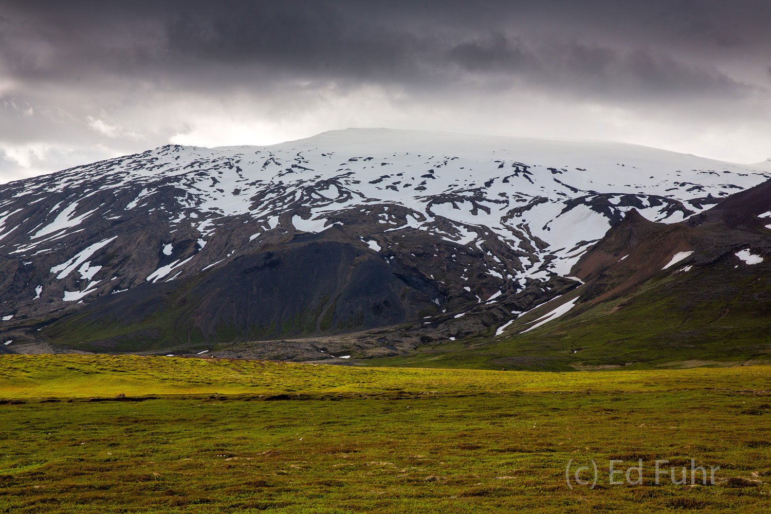 On Iceland even mid summer offers many reminders that winter and cold and ice are never really far away, especially near the...