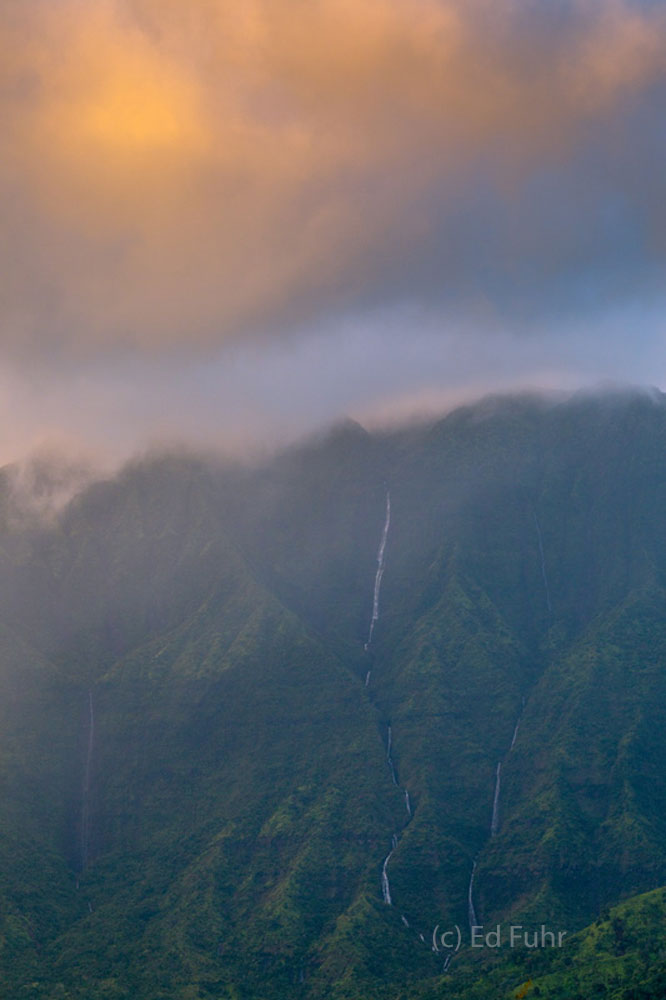 Rising high above Honalei Bay, this mountain is one of the wettest regions of Kauai, with countless waterfalls falling down its...