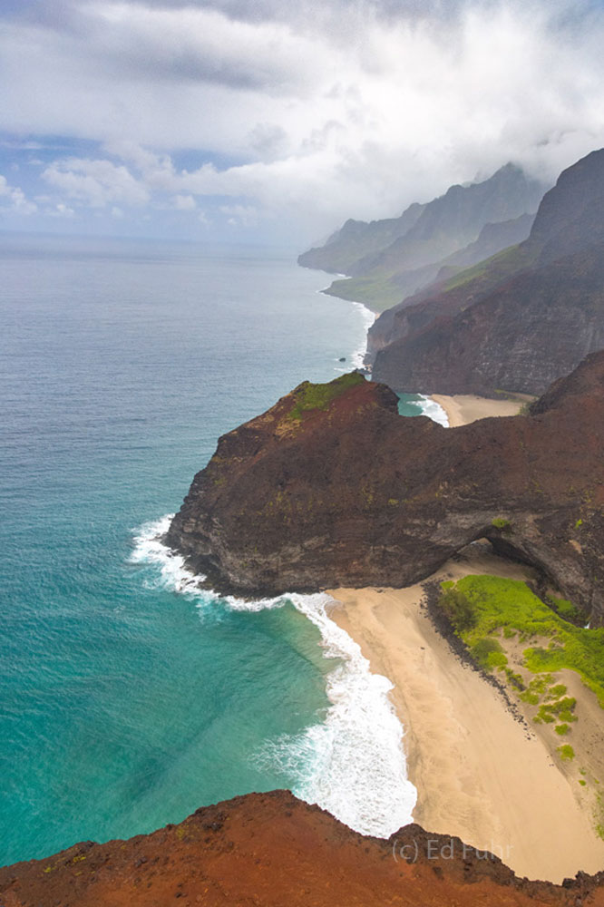 An aerial view of Kauai's shore just south of the Na Pali coast.
