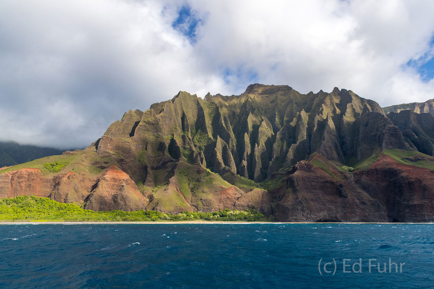 More than a million years old, and eroded by wind and rain, the towers of the Na Pali coastline.