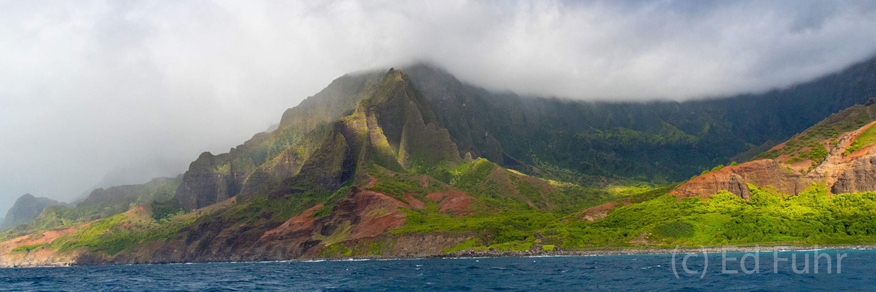 A panorama of the Na Pali coast captures the miles and miles of rugged coastline.