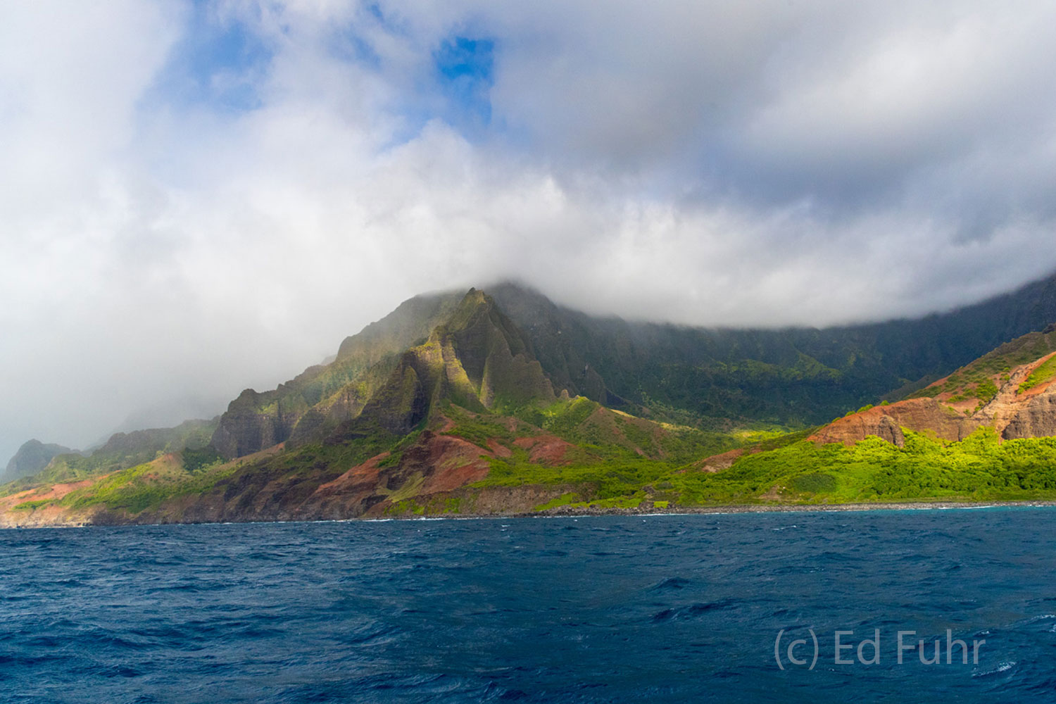 Another of my favorite images of the Na Pali coast, this photo captures its color and balance, with clouds and hints of blue...