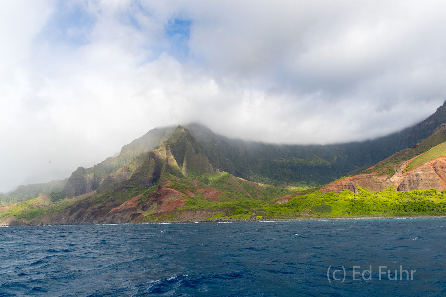 One of my favorite images of Kauai, this view of the coast captures its moodiness, color and rugged beauty.