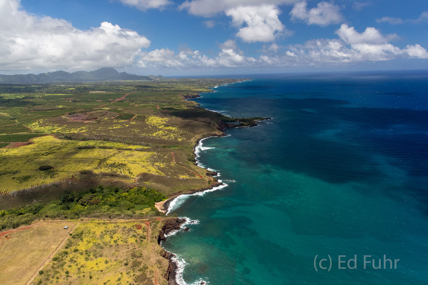 A classic view of the Kauai shore from my windowless helicopter.