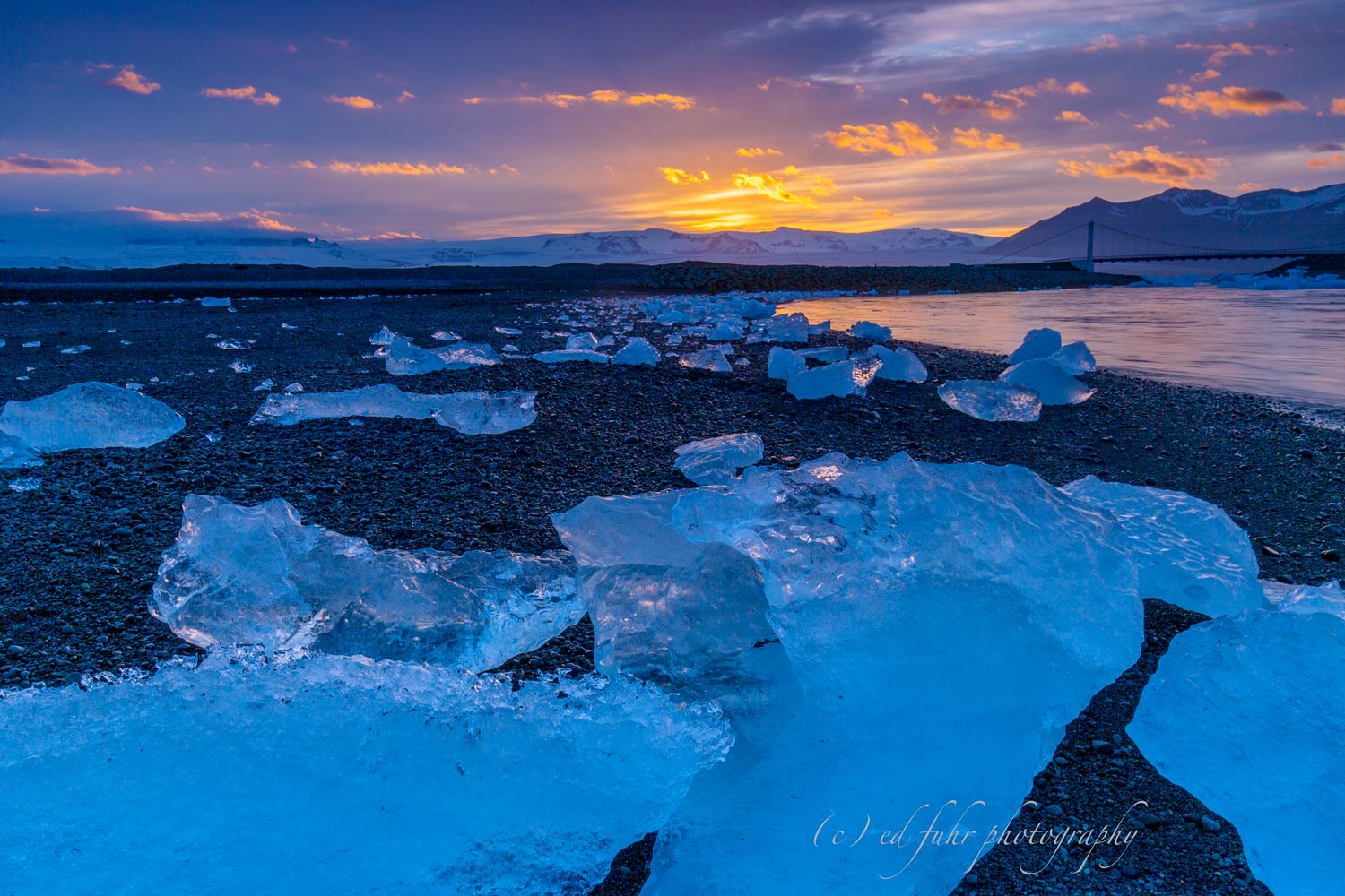Midnight on Diamond Beach On Iceland's south coast, icebergs fill the Jökulsárlón glacier lagoon, only to wash up on the shore of Diamond Beach, creating...