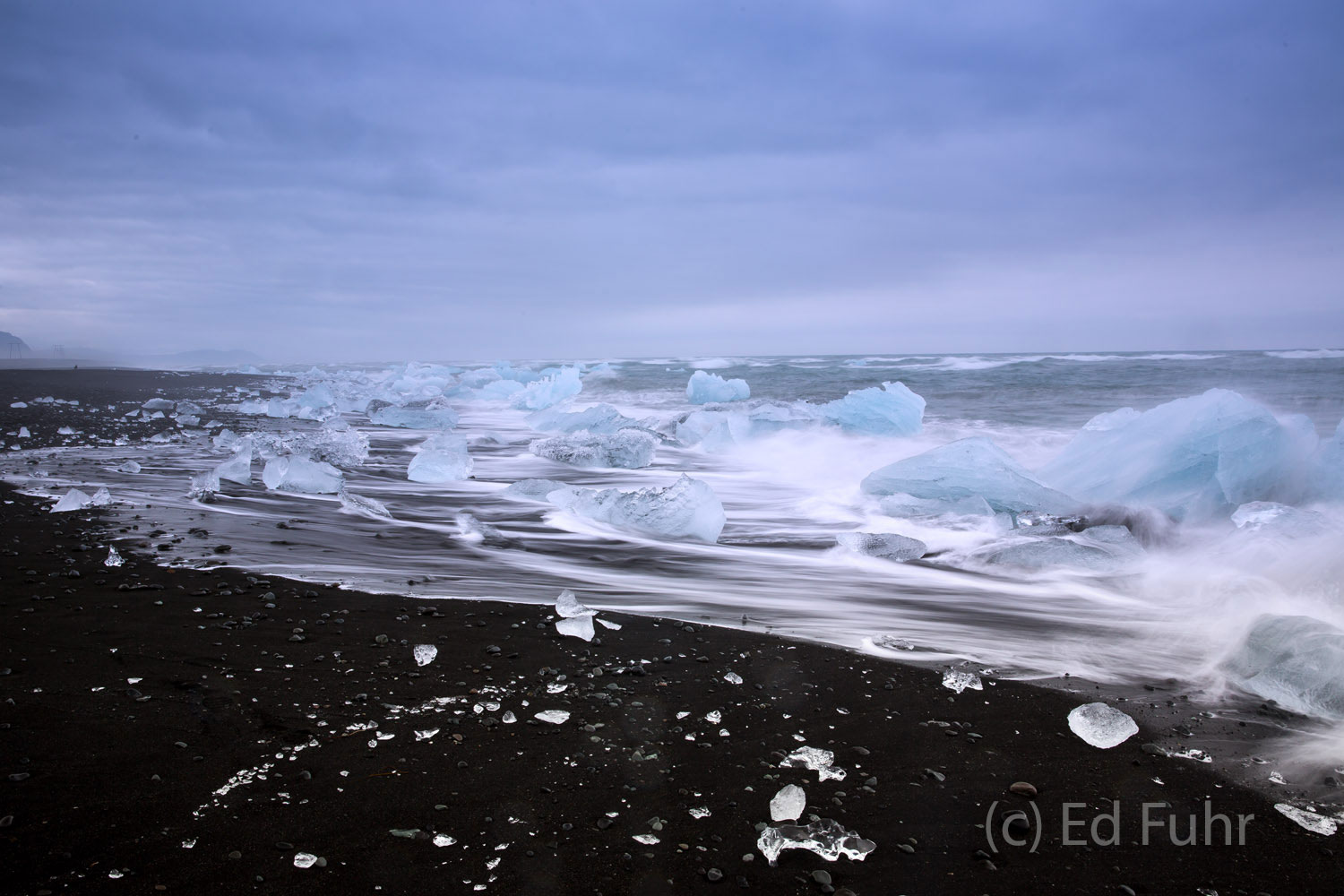 Orphans on the Beach Every day the tide enters and leaves the Jokulsaron Lagoon via a quarter mile inlet, sweeping icebergs into the North Atlantic...