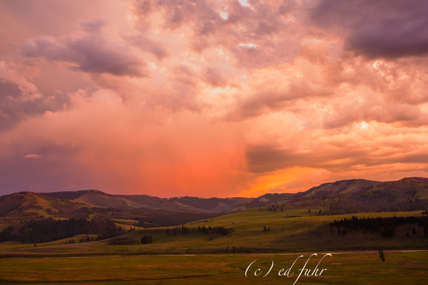 As a summer storm retreats, a spectacular sunset erupts over the magical Lamar Valley.