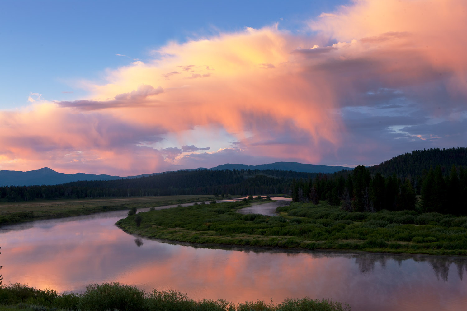 For fewer than 5 minutes a brilliant sky illuminates the pre-dawn along the Oxbow Bend.&nbsp;
