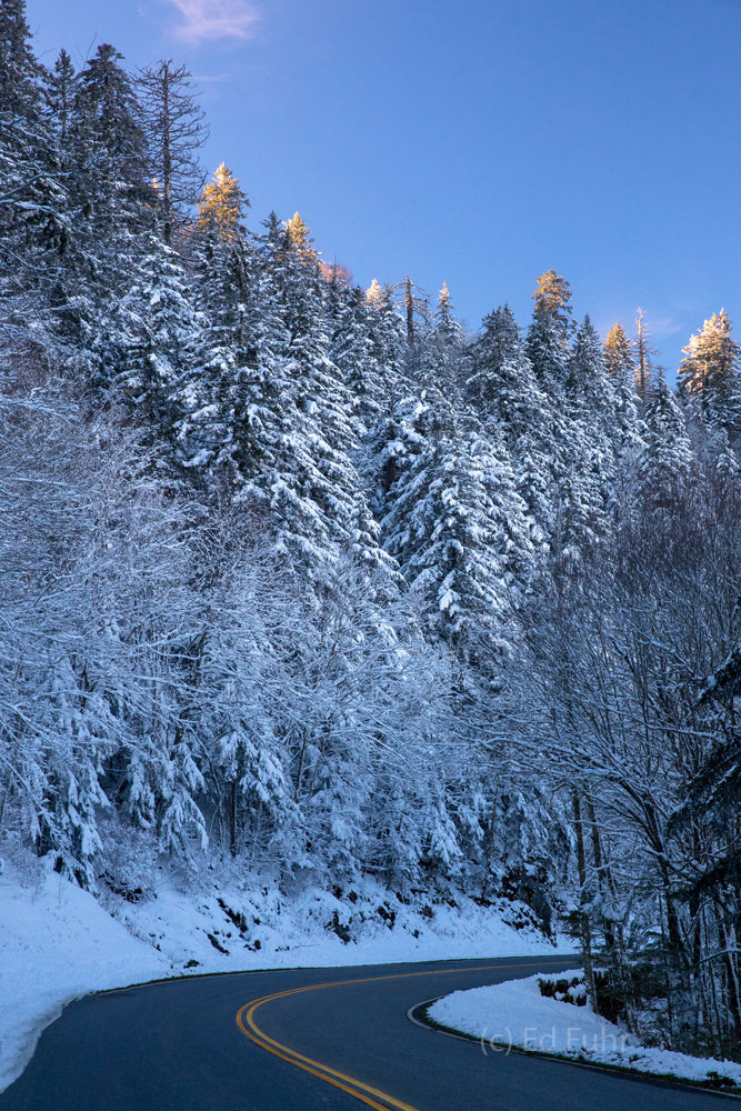 Passing Day Twilight atop the snow-covered ridges near Newfound Gap.