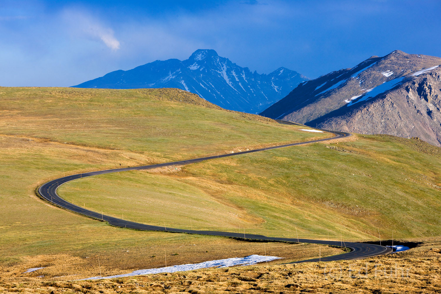 The Trail Ridge Road snakes its way over the Continental Divide, crossing through tundra above RMNP's treeline. &nbsp;Snow is...