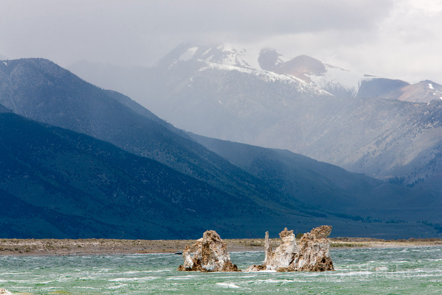 Storm clouds gather over the high country and Sierras that divide Mono Lake from Yosemite.