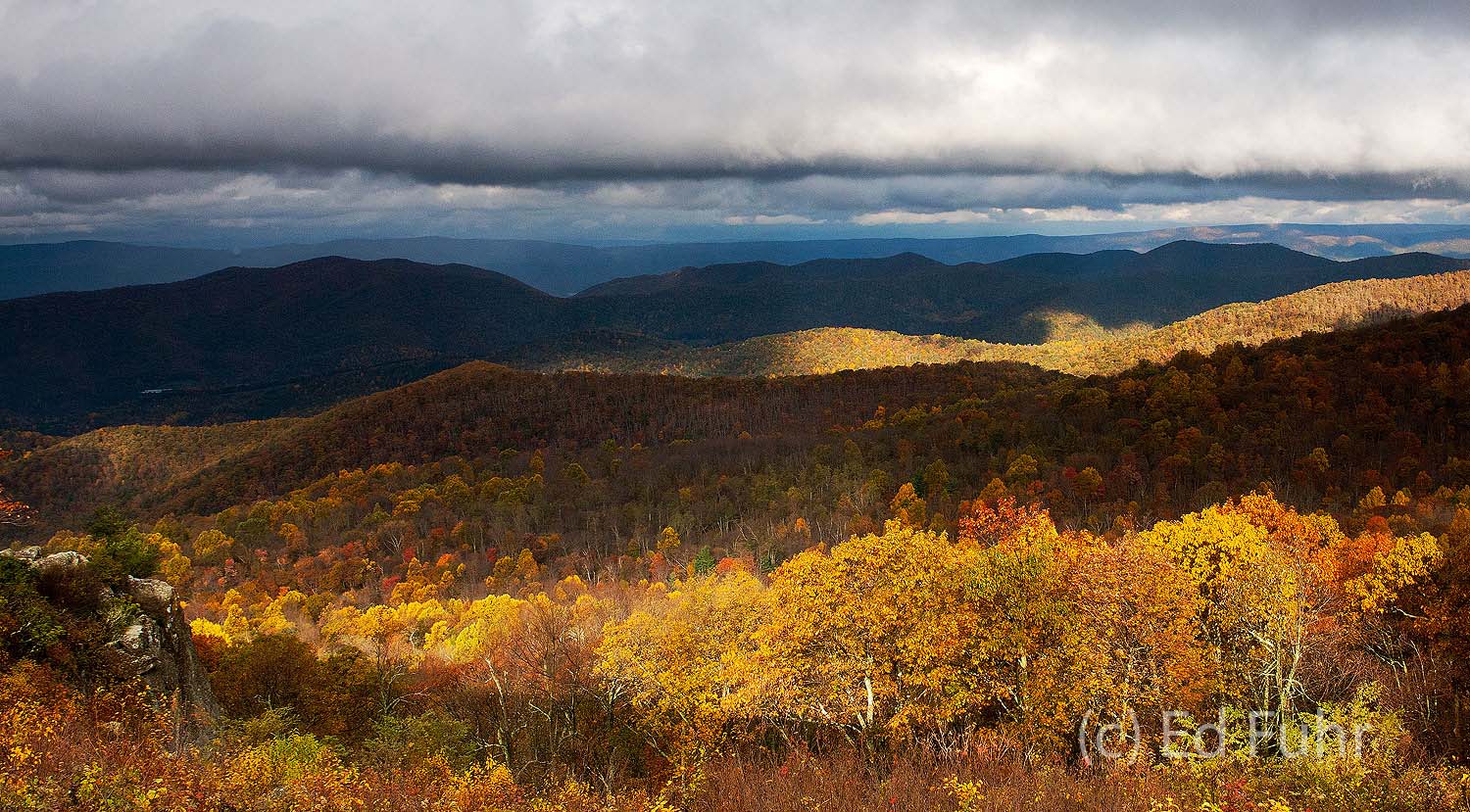 Layers of light and shadow cross the mountain vista to the west of the Point overlook.