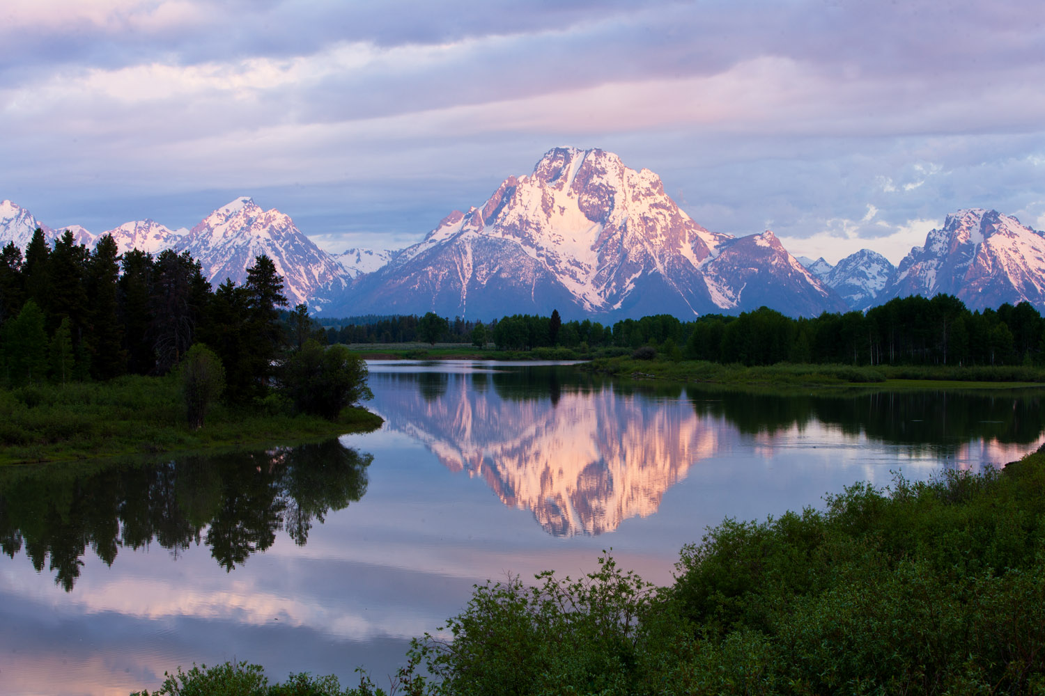 Mount Moran Sunrise III Morning on the Oxbow Bend is gradually revealed as the sun strikes Mount Moran. Ducks, geese and assorted widlife cavort...