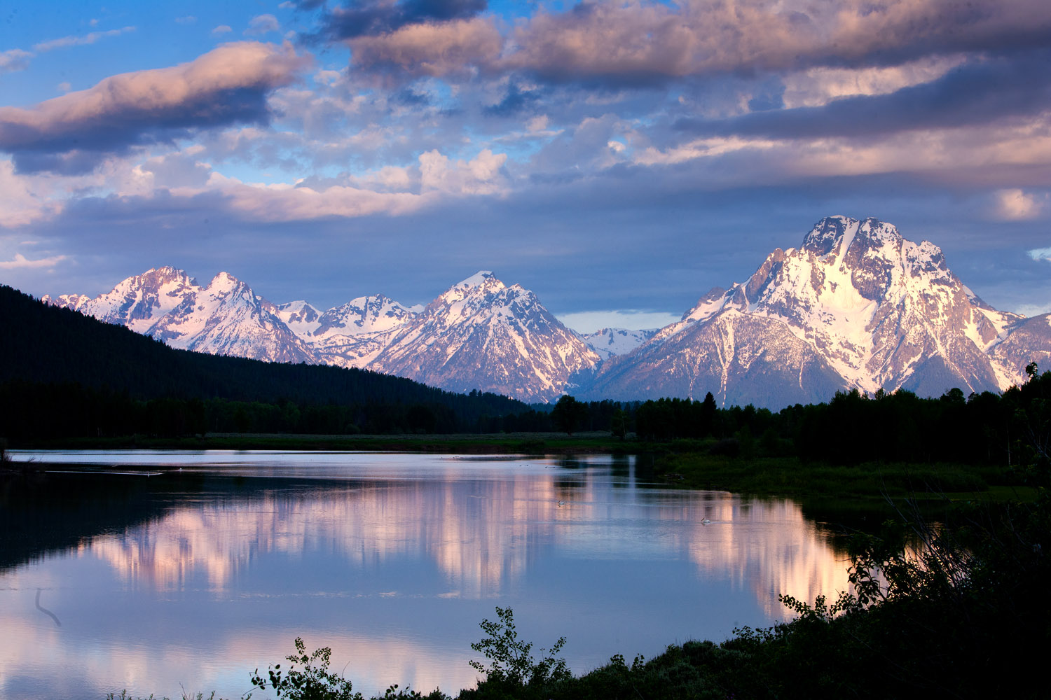 Mount Moran Sunrise II Dawn's first rays light the peak of Mount Moran and the Teton Range above Oxbow Bend. 